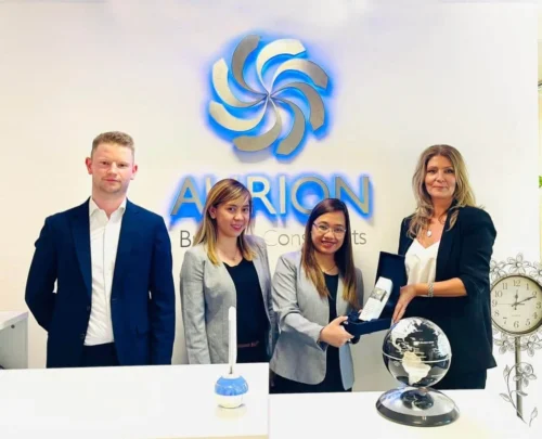 AURION, receiving memento from IFZA Business Team